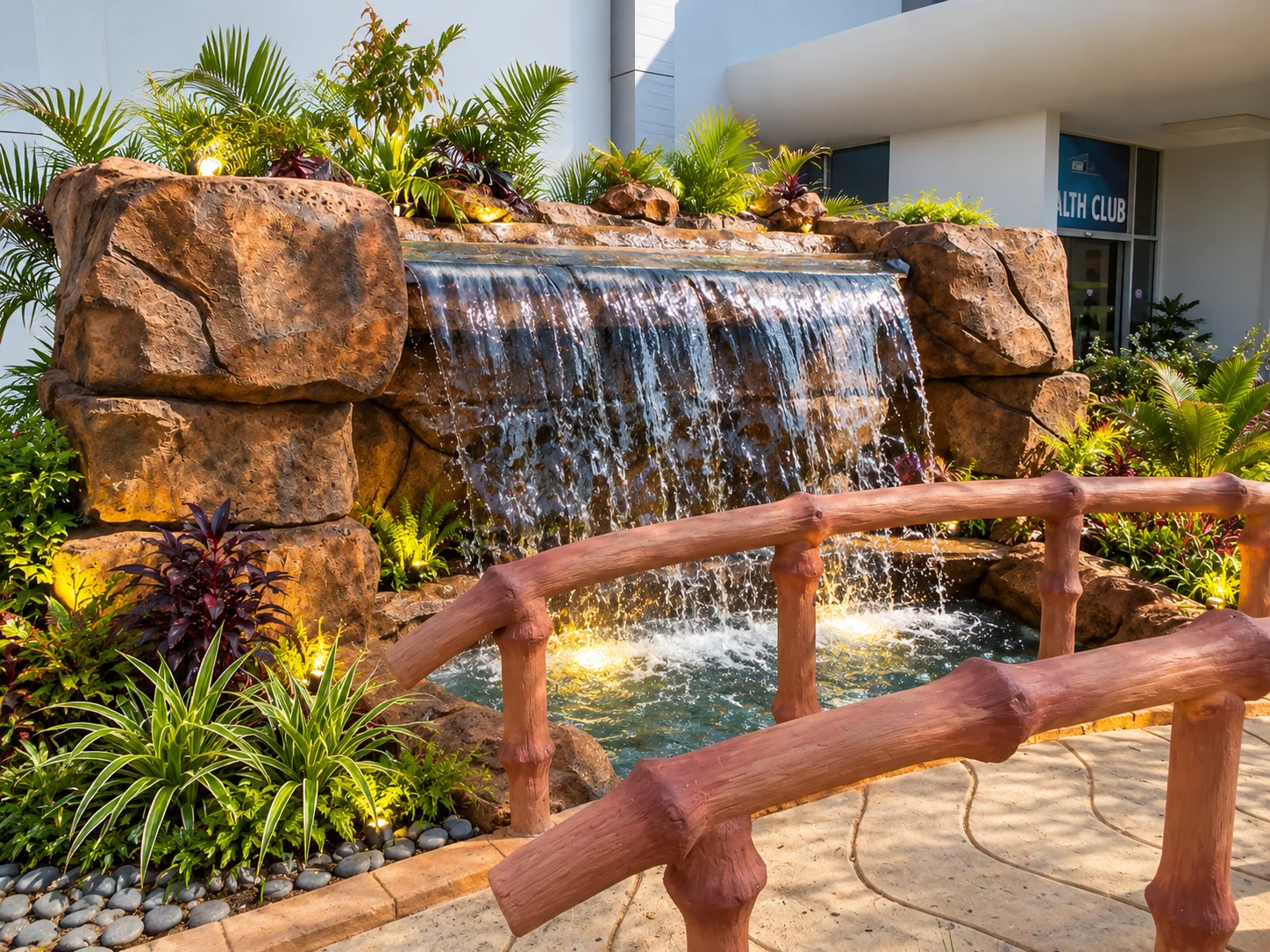Waterfall by the veranda. Water Features & Fountains from the Mock Rock Gardening portfolio.