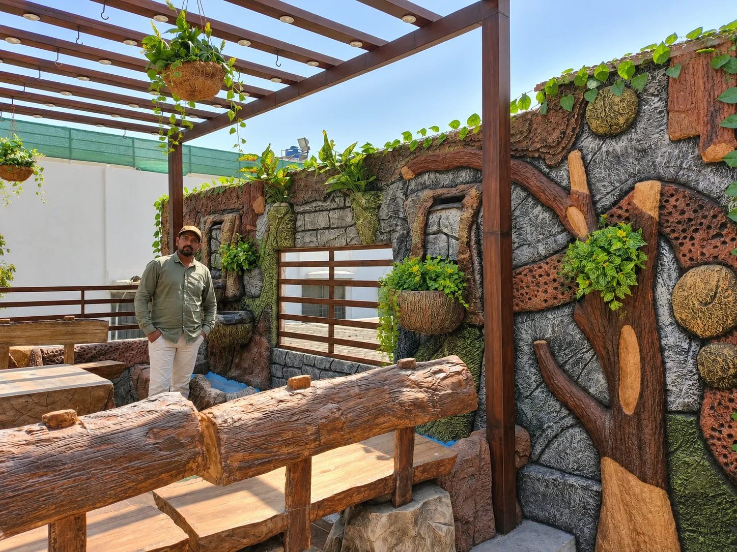 A retreat in wood and stone. Mock Rock, Faux Wood & Sculptures from the Mock Rock Gardening portfolio.